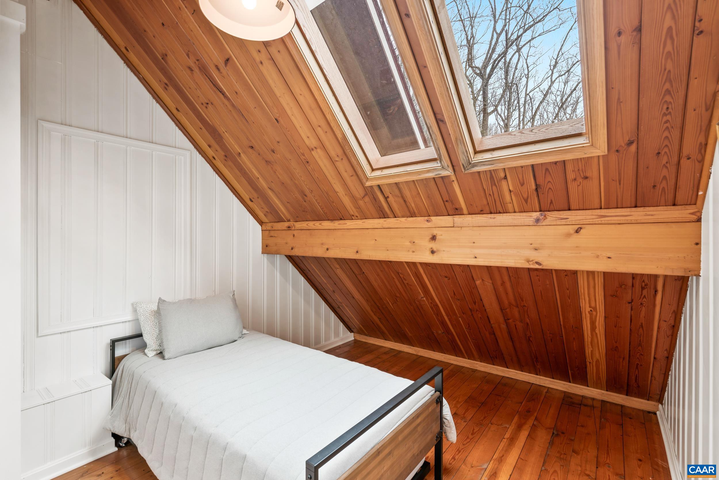 4496 Weakley Hollow Road Syria, VA 22743 - Photo 31 of 37 a bedroom with a bed and a dresser