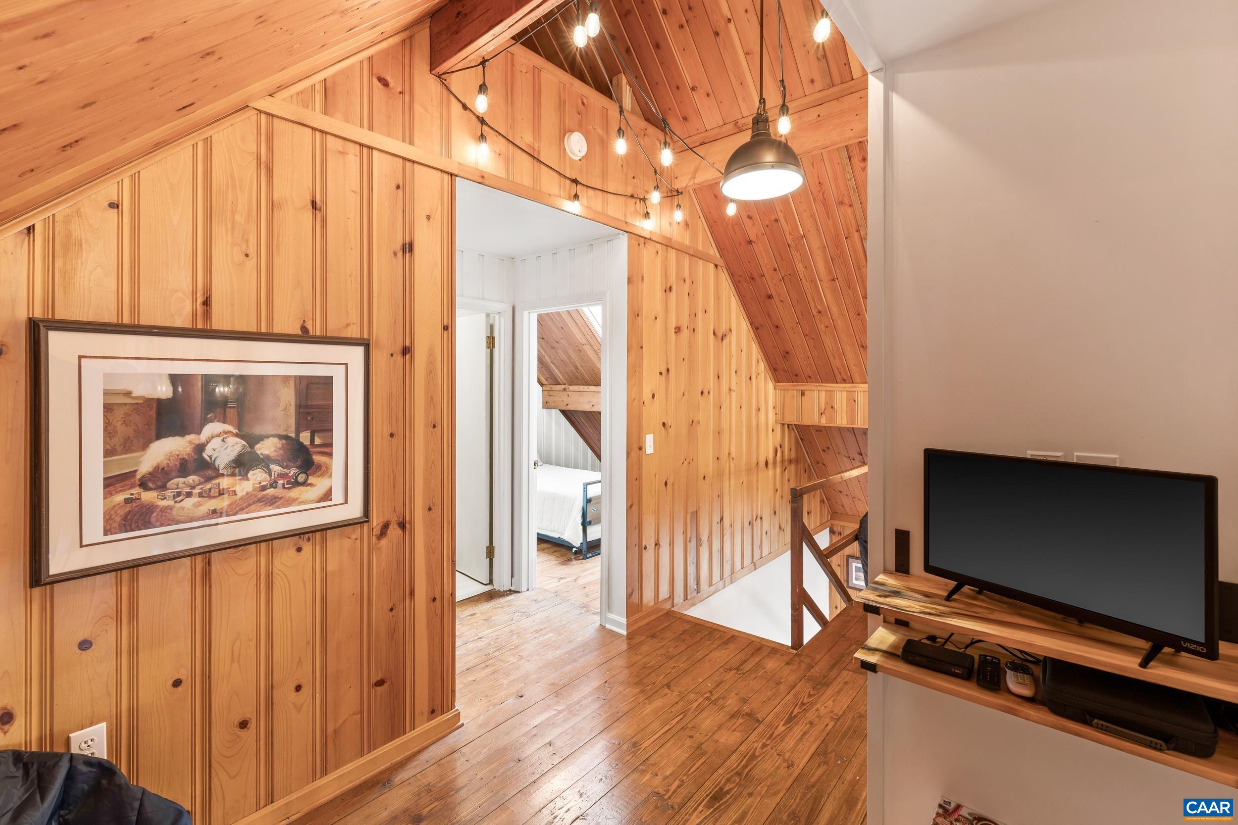 4496 Weakley Hollow Road Syria, VA 22743 - Photo 35 of 37 a view of a livingroom with furniture and wooden floor
