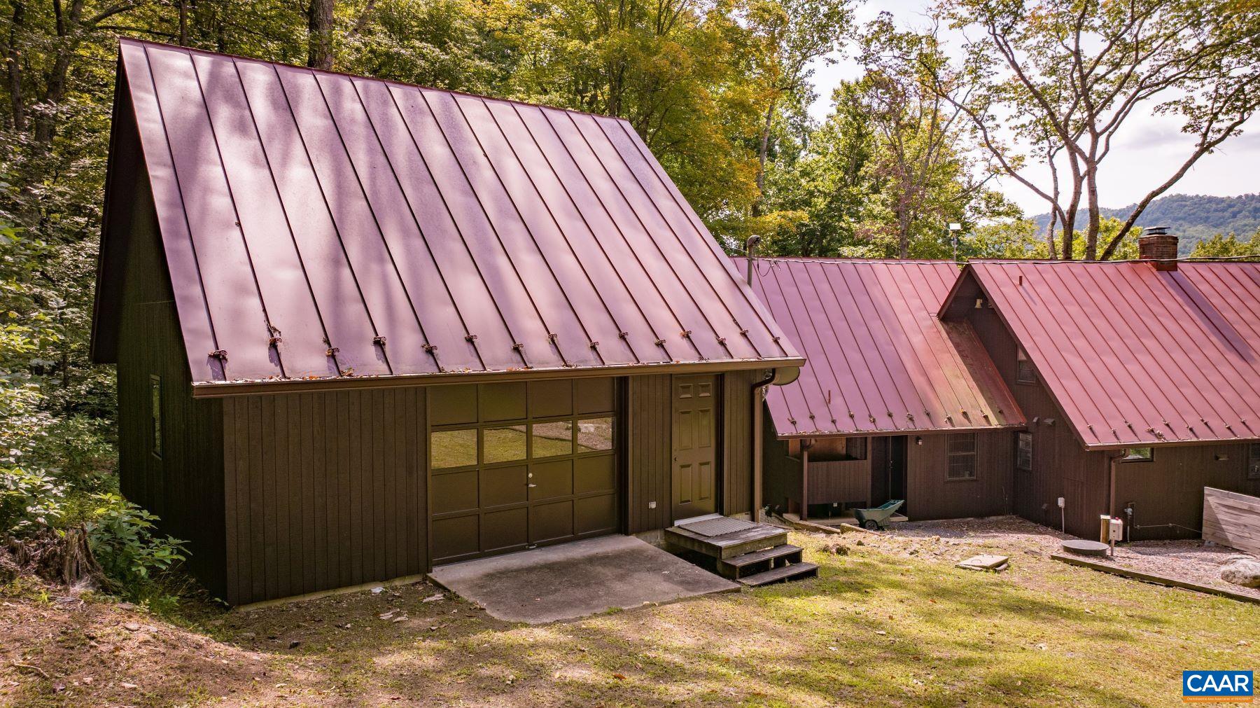 4496 Weakley Hollow Road Syria, VA 22743 - Photo 4 of 37 a backyard of a house with seating space