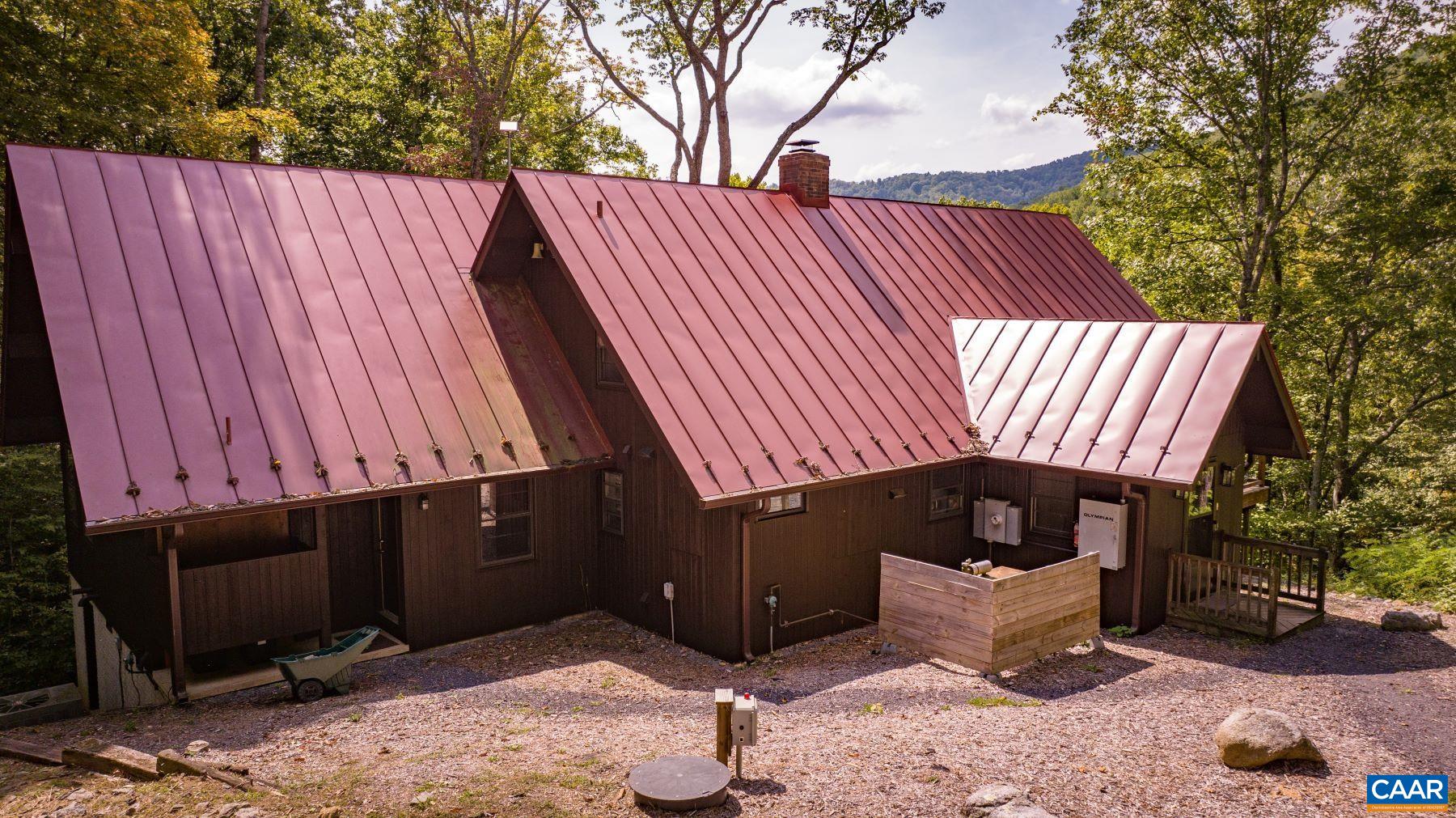 4496 Weakley Hollow Road Syria, VA 22743 - Photo 5 of 37 a view of a backyard with a tub