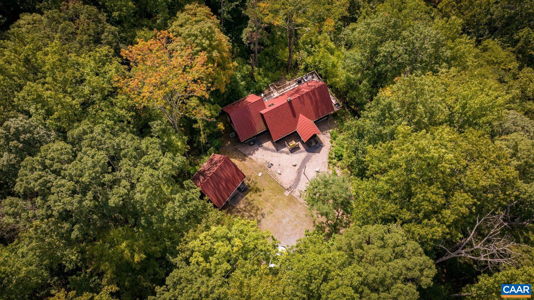 4496 Weakley Hollow Road Syria, VA 22743 - Photo 6 of 37 an aerial view of a house with a yard and swimming pool