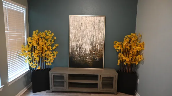 a vase of flowers sitting on a table