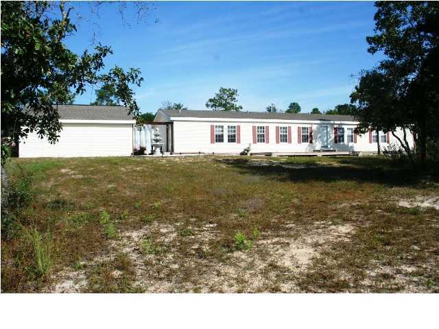 490 Long Road DeFuniak Springs, FL 32433 - Photo 12 of 22 a balcony with view of a lake view