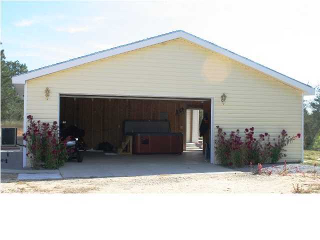 490 Long Road DeFuniak Springs, FL 32433 - Photo 3 of 22 a front view of a house