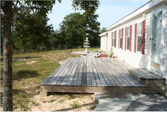 490 Long Road DeFuniak Springs, FL 32433 - Photo 21 of 22 a view of swimming pool with a patio