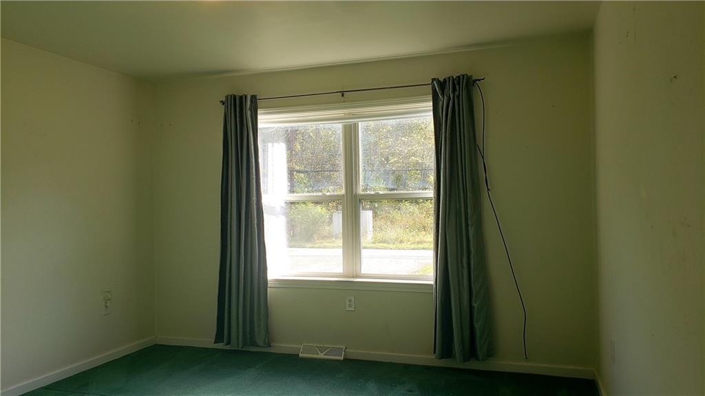 113 Ross Road Ligonier, PA 15658 - Photo 14 of 29 a view of an empty room and window