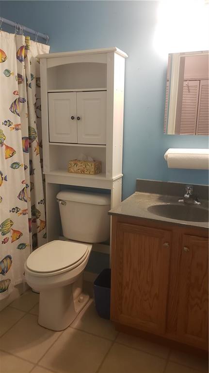 113 Ross Road Ligonier, PA 15658 - Photo 17 of 29 a bathroom with a granite countertop toilet and a sink