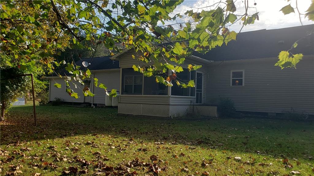 113 Ross Road Ligonier, PA 15658 - Photo 4 of 29 a house view with a garden space