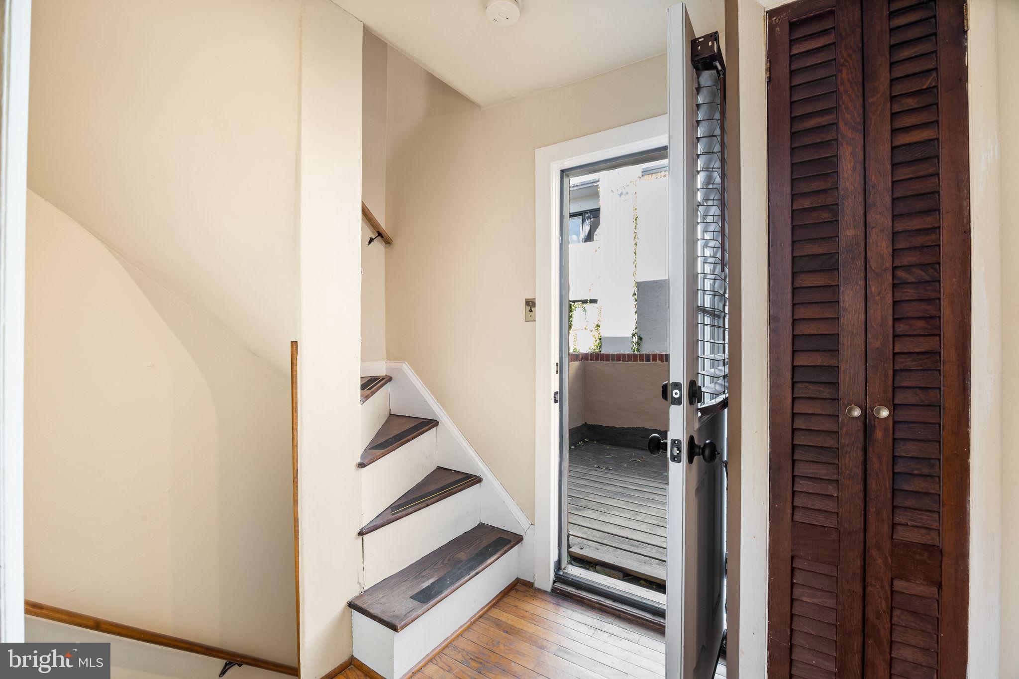 1905 Rodman Street Philadelphia, PA 19146 - Photo 14 of 22 a view of a hallway with white walls and entryway