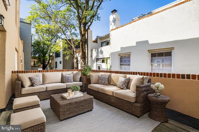 1905 Rodman Street Philadelphia, PA 19146 - Photo 15 of 22 a view of a patio with couches and a potted plant on a table