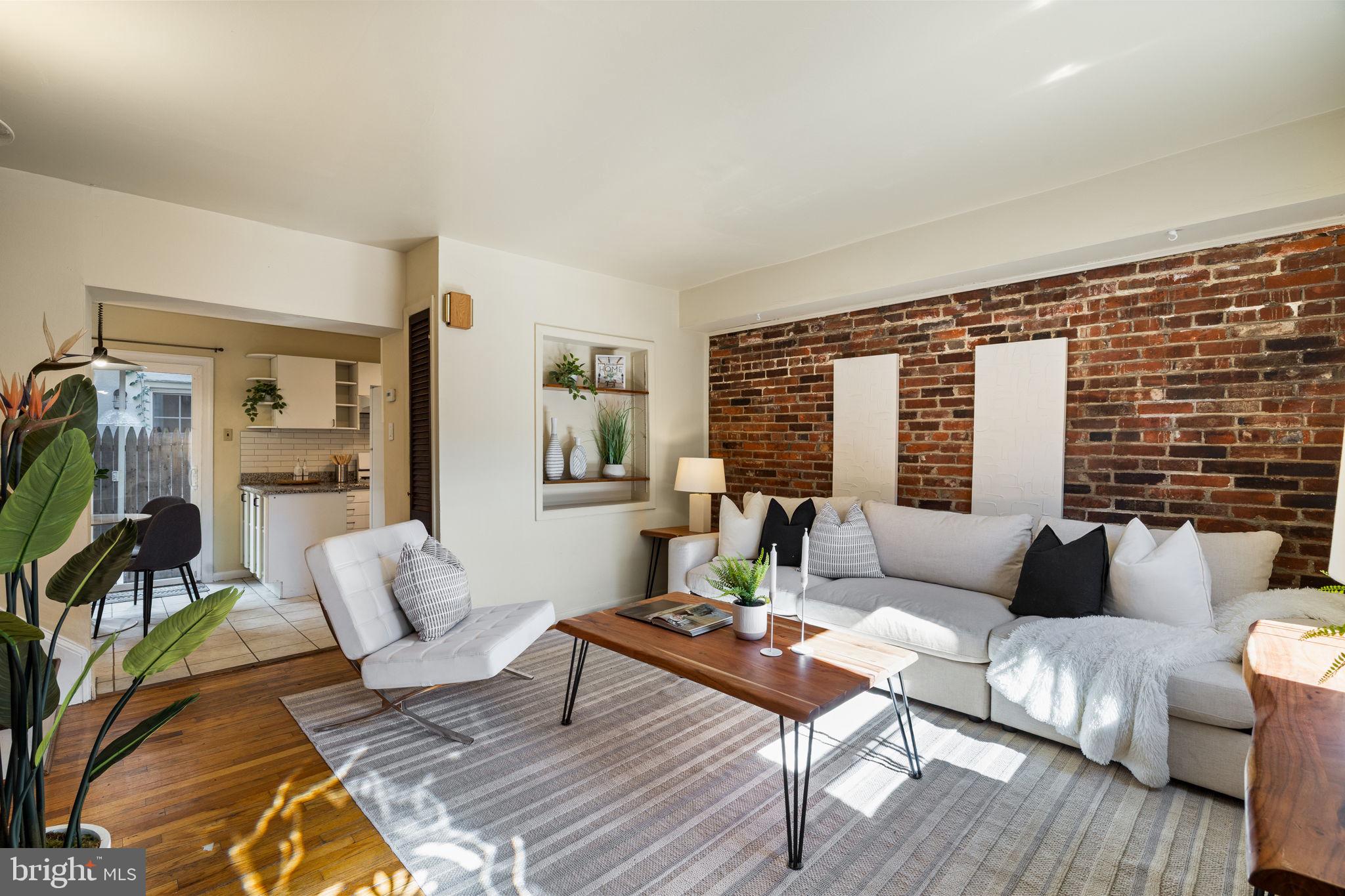 1905 Rodman Street Philadelphia, PA 19146 - Photo 2 of 22 a living room with furniture and a table
