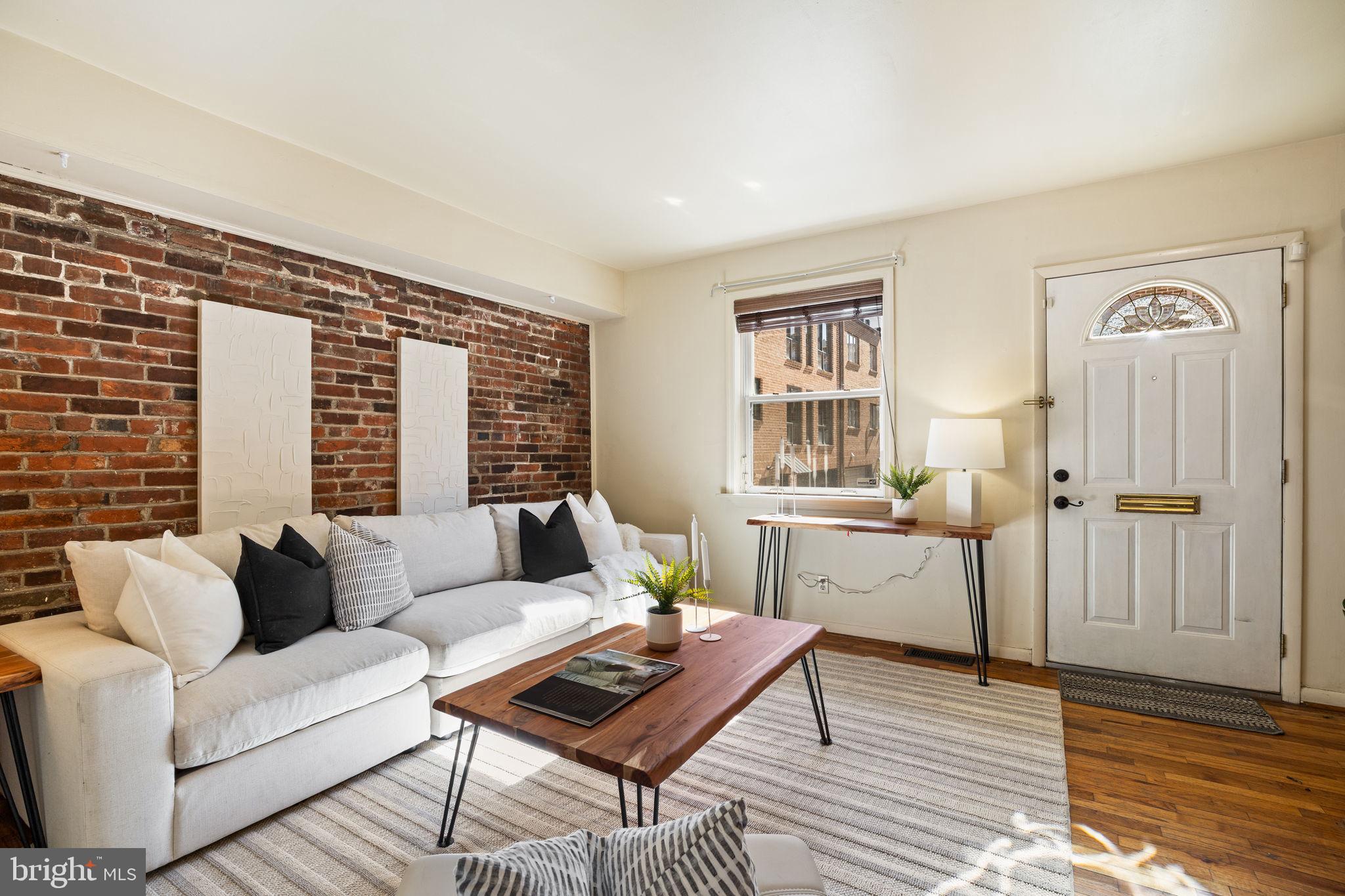 1905 Rodman Street Philadelphia, PA 19146 - Photo 5 of 22 a living room with furniture and a window
