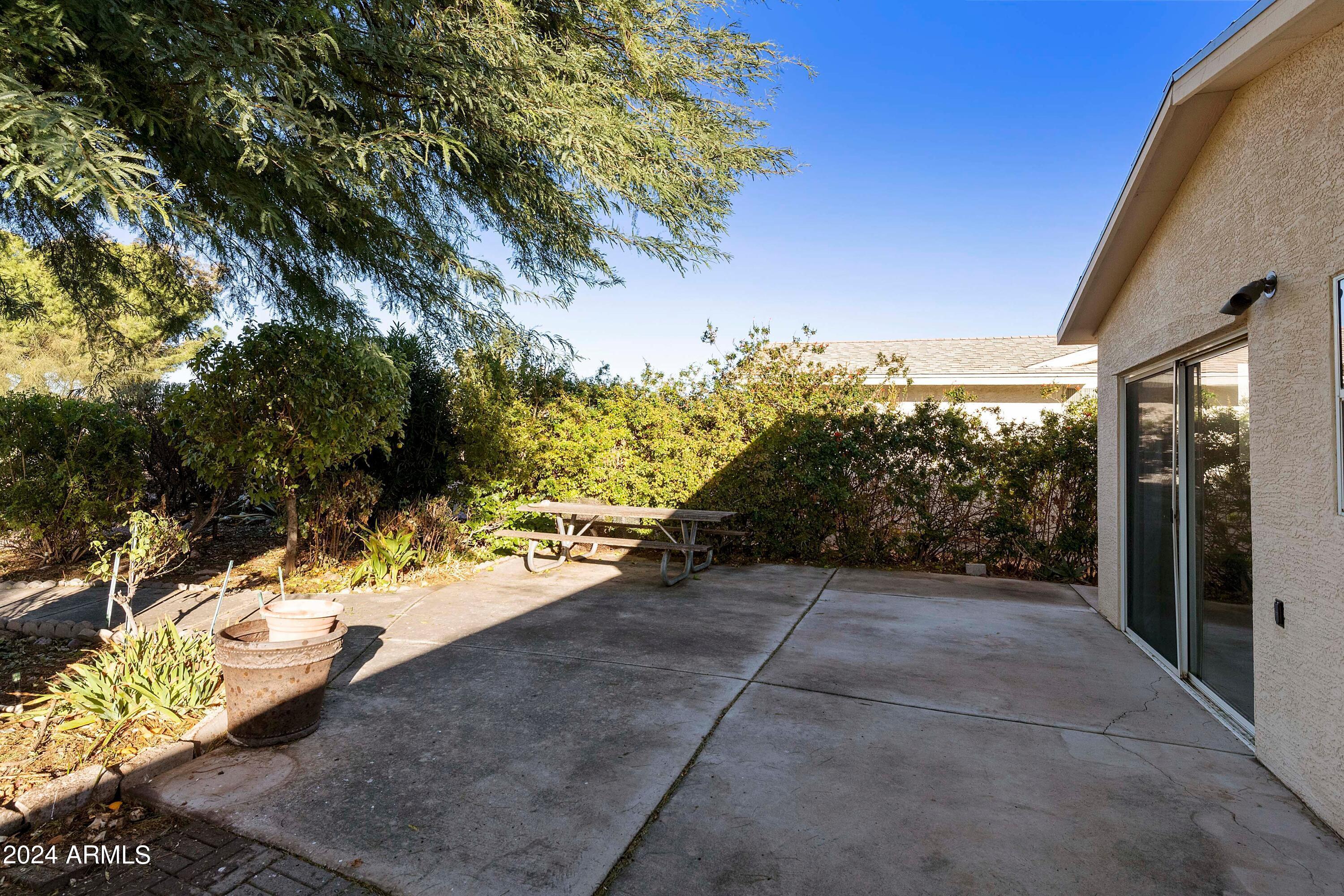 970 South 80th Street Mesa, AZ 85208 - Photo 31 of 45 Patio Area off Primary Bedroom