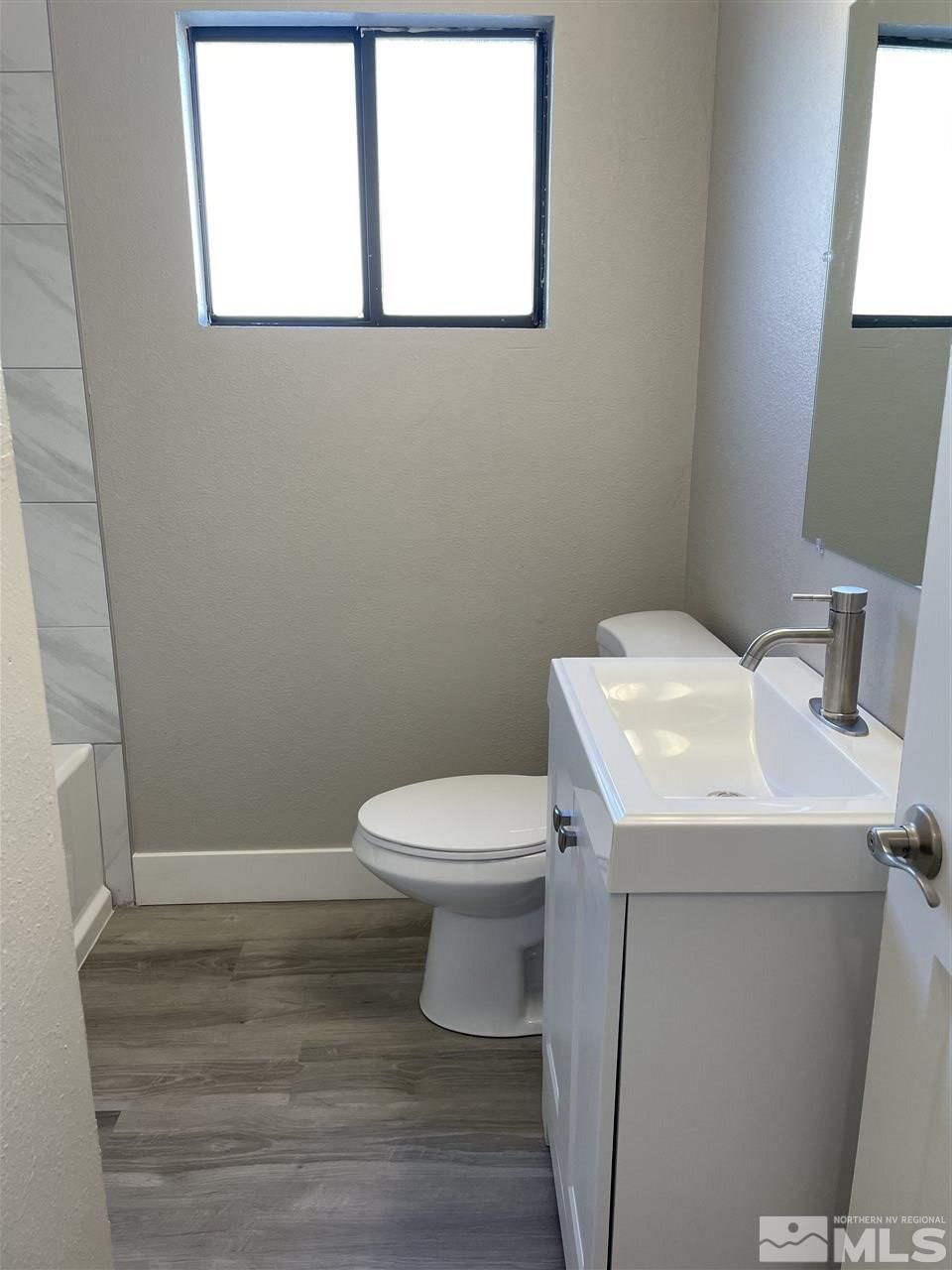 1440 Upton Way Sparks, NV 89431 - Photo 16 of 28 a bathroom with a sink and a toilet