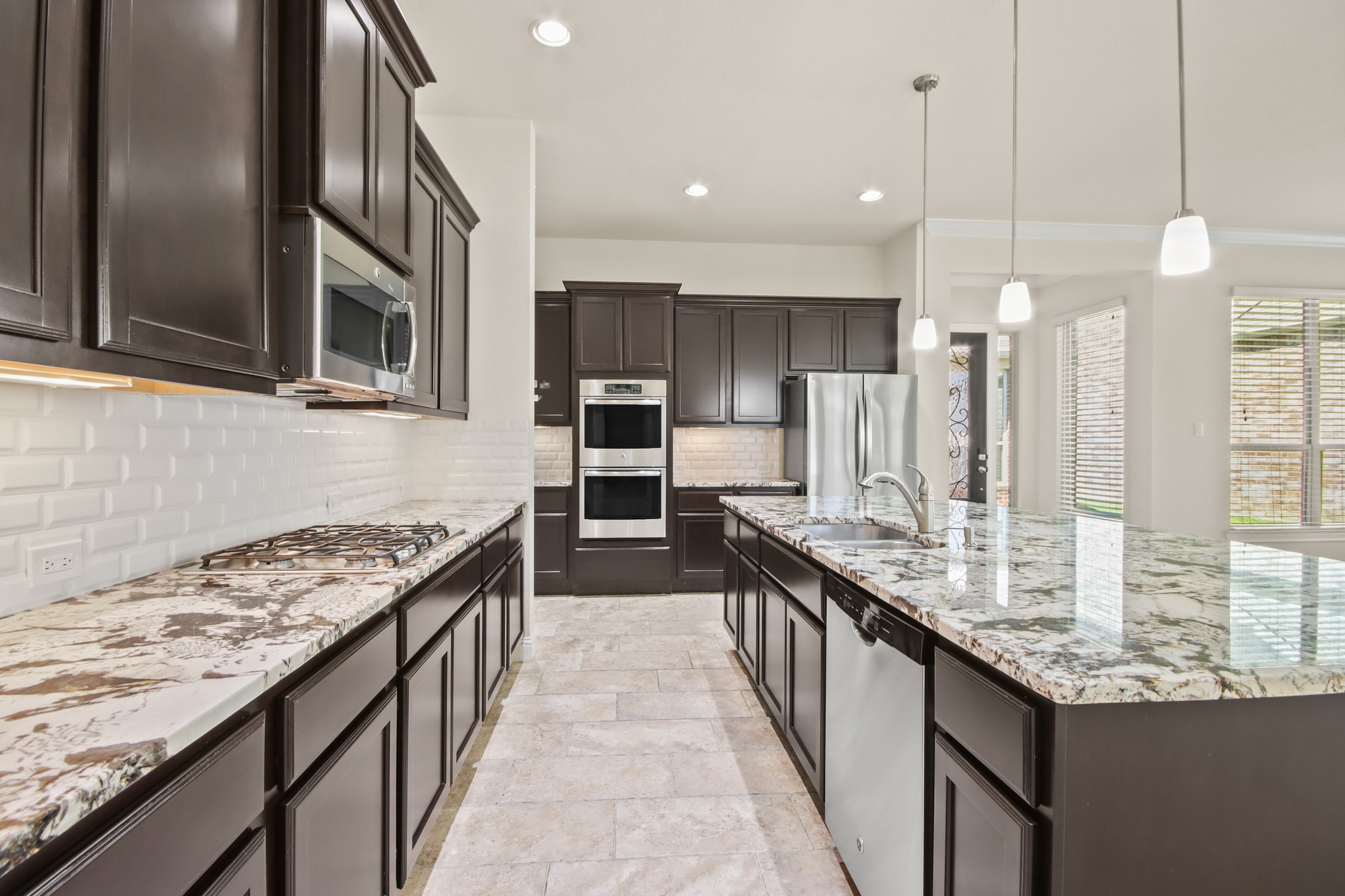 8931 Leaning Hollow Lane Spring, TX 77379 - Photo 10 of 38 A kitchen you will love to cook in! Complete with double wall ovens, Stainless Steel Appliances, and tons of cabinets for storage.