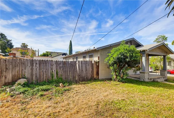 a front view of a house having yard