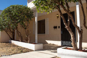 511 Mance Street Bisbee, AZ 85603 - Photo 4 of 22 a view of a house with a tree