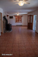 511 Mance Street Bisbee, AZ 85603 - Photo 6 of 22 a view of a livingroom with an empty space and a window