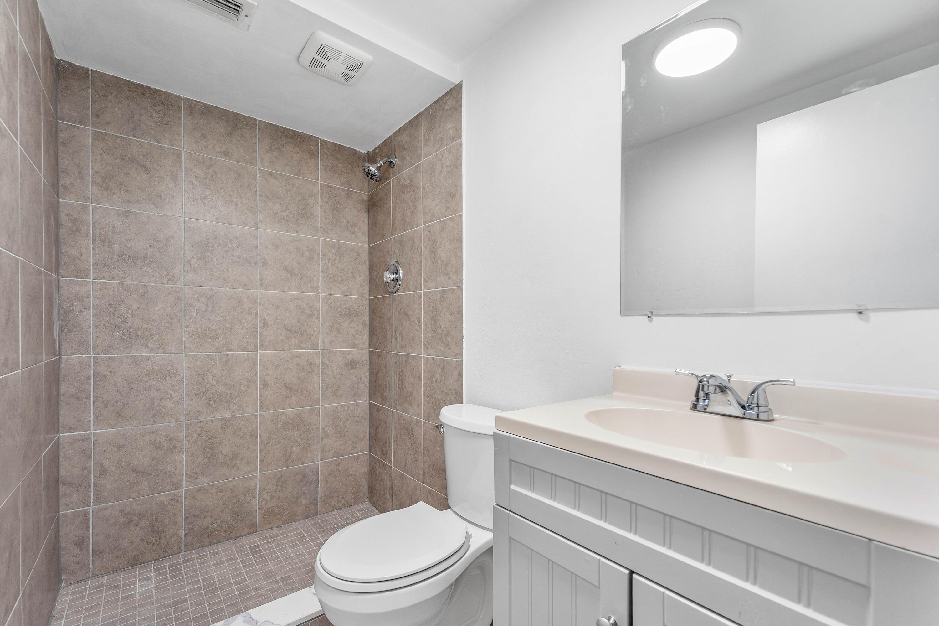 22725 Southwest 66th Avenue, Unit 103 Boca Raton, FL 33428 - Photo 10 of 14 Bathroom – Updated Walk-In Shower
