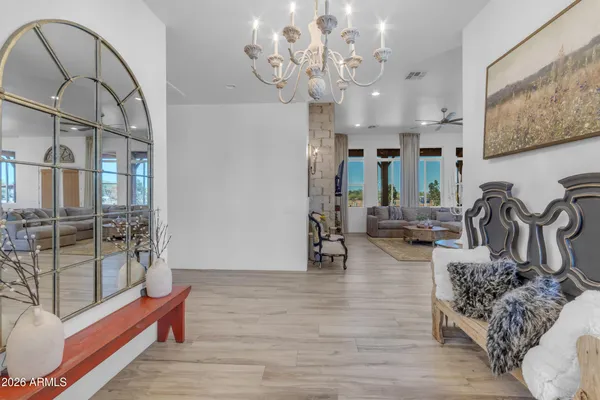 a kitchen with a refrigerator and a stove top oven