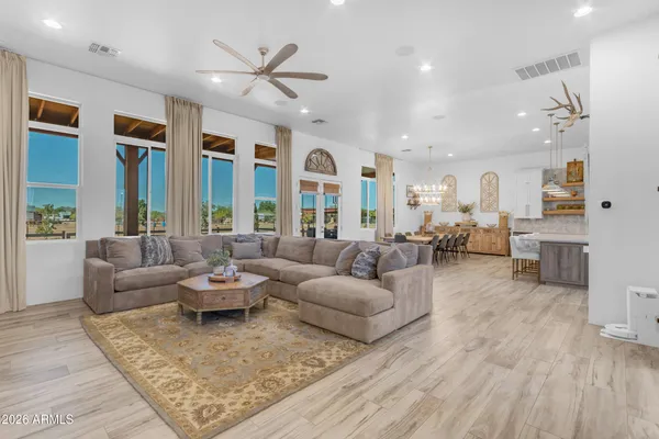 a kitchen with a refrigerator and cabinets