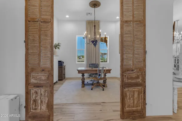 a spacious bathroom with a double vanity sink a mirror and a shower