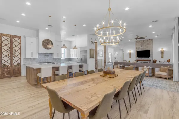 a en suite bathroom with a double vanity sink and a mirror