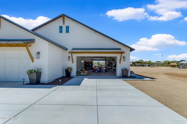 a view of a house with swimming pool yard and porch
