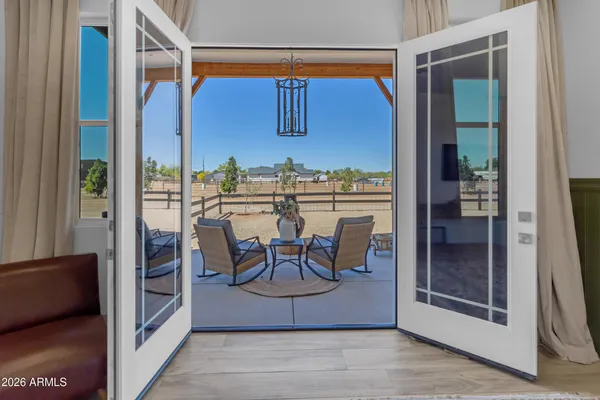 an aerial view of residential houses with outdoor space