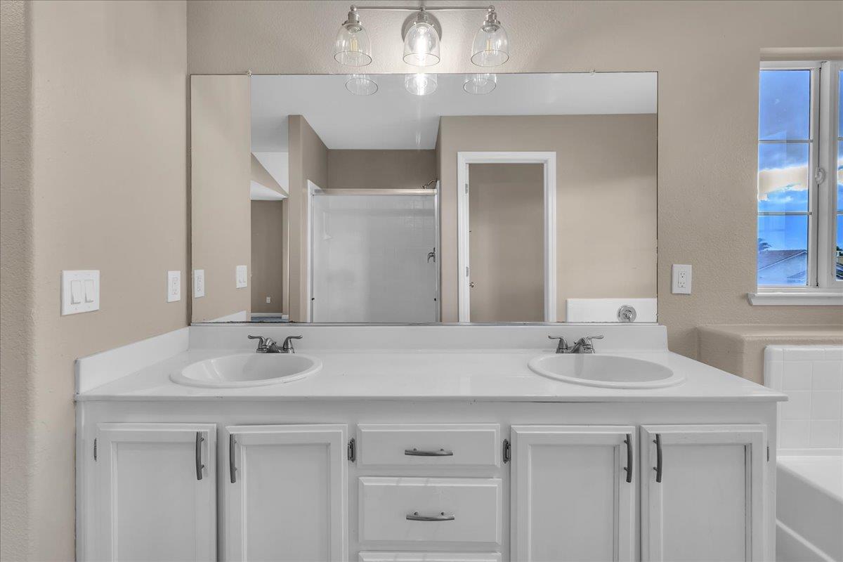 1218 Carmelo Soledad, CA 93960 - Photo 14 of 43 a bathroom with a sink and a mirror