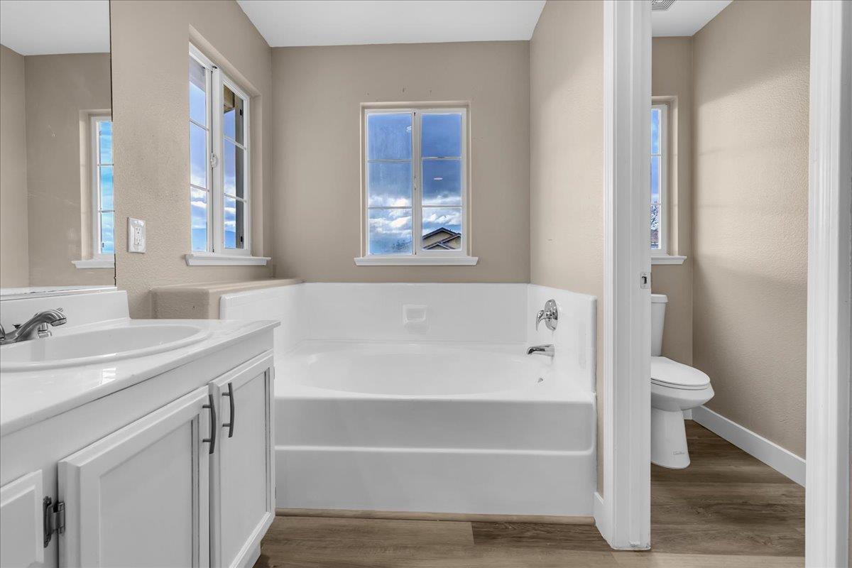 1218 Carmelo Soledad, CA 93960 - Photo 15 of 43 a bathroom with a bathtub and a sink