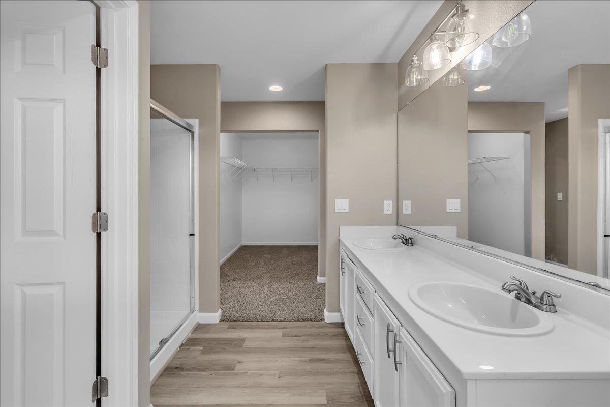1218 Carmelo Soledad, CA 93960 - Photo 16 of 43 a bathroom with a double vanity sink and a mirror