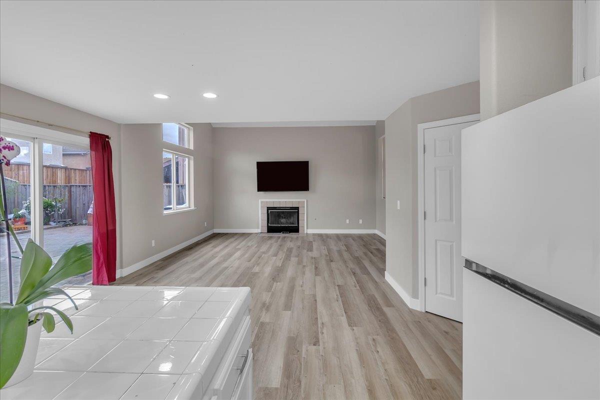 1218 Carmelo Soledad, CA 93960 - Photo 2 of 43 a room with a bed and a flat screen tv