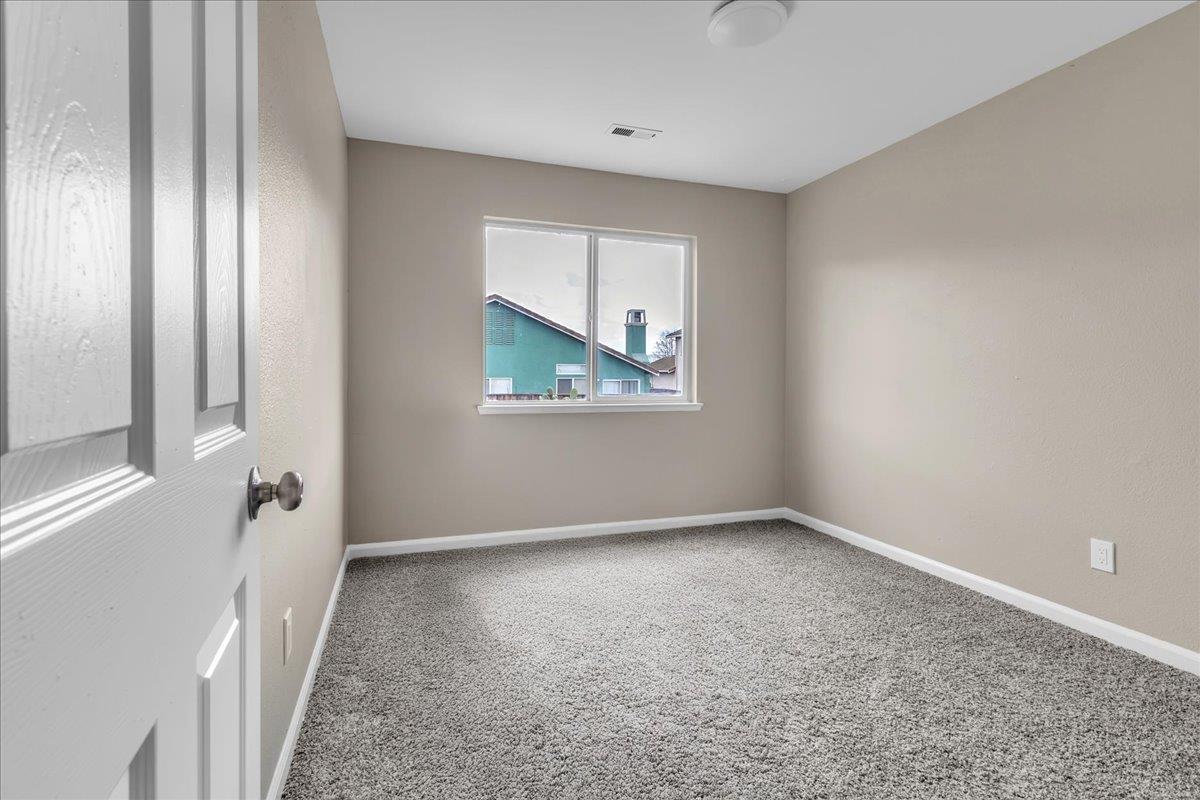 1218 Carmelo Soledad, CA 93960 - Photo 21 of 43 a view of an empty room with a window