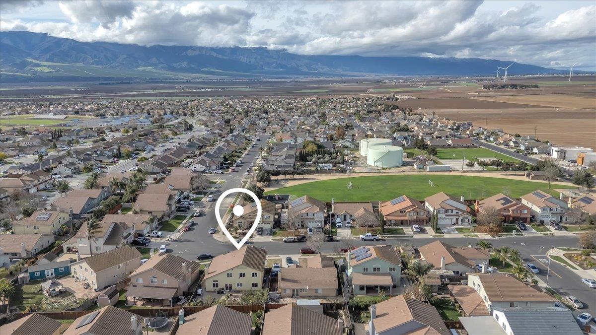 1218 Carmelo Soledad, CA 93960 - Photo 28 of 43 an aerial view of a house with a ocean view