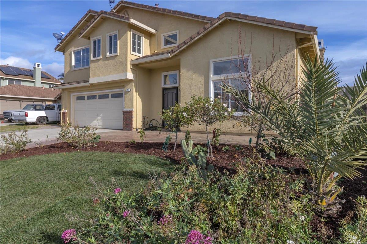 1218 Carmelo Soledad, CA 93960 - Photo 33 of 43 a front view of a house with a yard