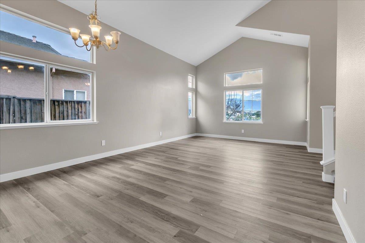 1218 Carmelo Soledad, CA 93960 - Photo 37 of 43 a view of an empty room with wooden floor and a window