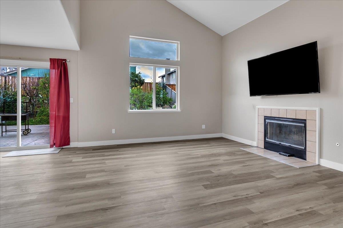 1218 Carmelo Soledad, CA 93960 - Photo 40 of 43 a view of empty room with wooden floor and fireplace