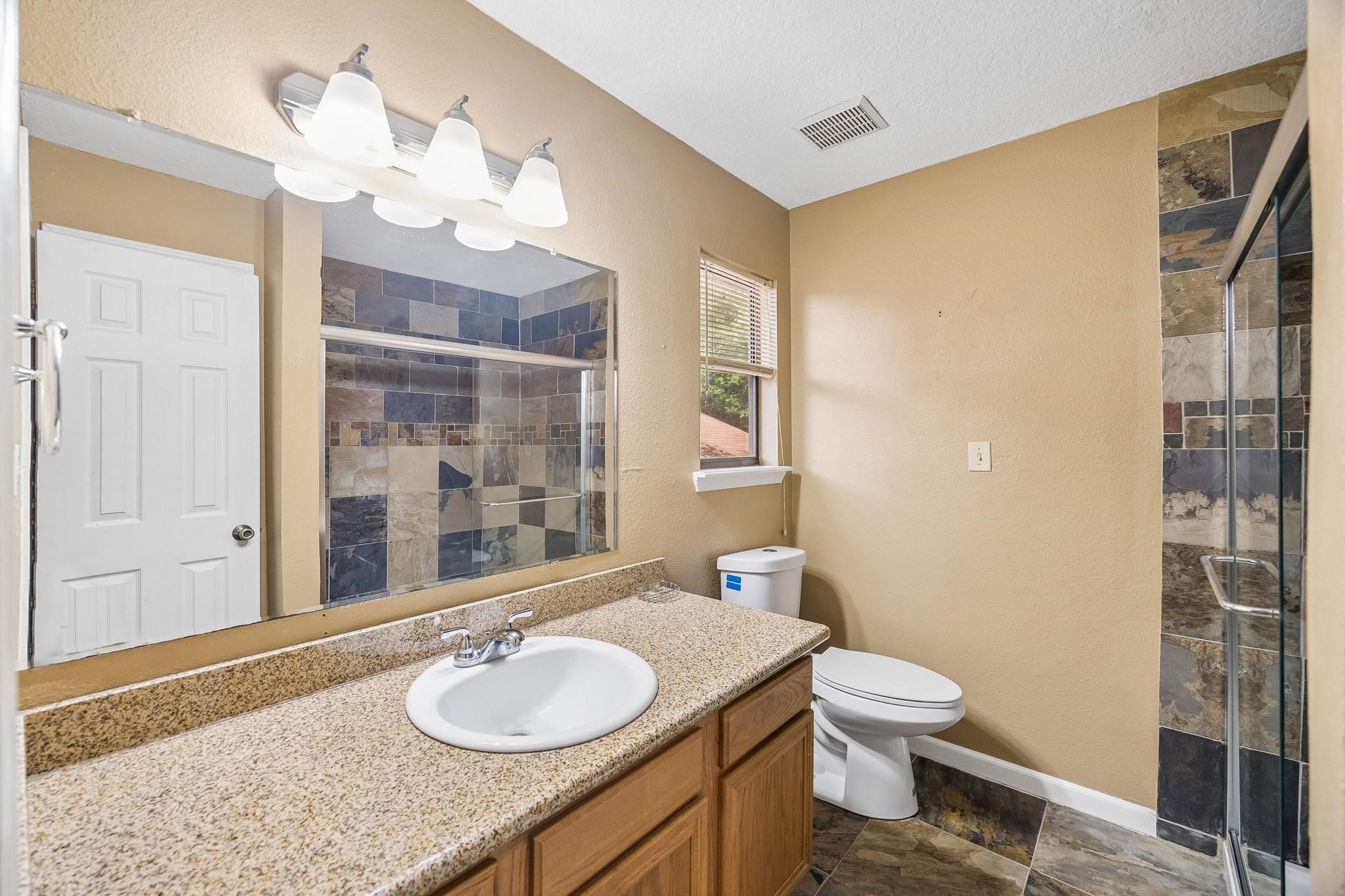 422 Nursery Road Spring, TX 77380 - Photo 8 of 16 En suite primary bathroom with walk in shower