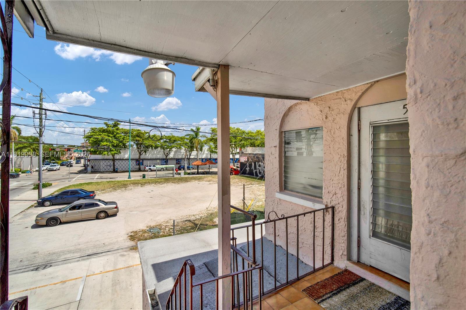 829 Southwest 19th Avenue Miami, FL 33135 - Photo 42 of 54 a view of a patio with a table and chairs