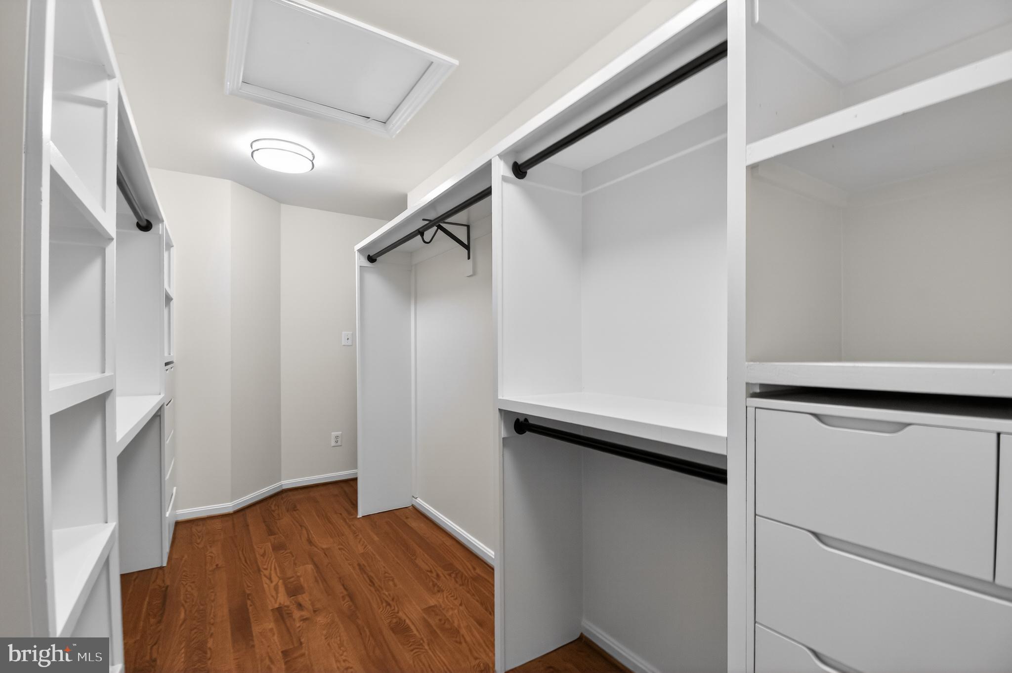 11728 Stuart Mill Road Oakton, VA 22124 - Photo 32 of 68 Spacious, modern walk-in closet design.