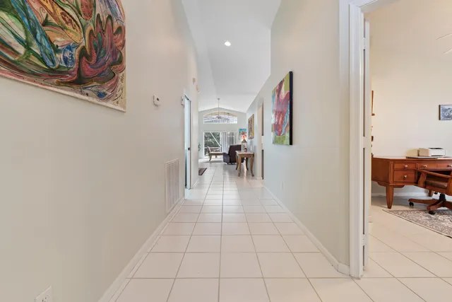 wooden floor with a view of a living room