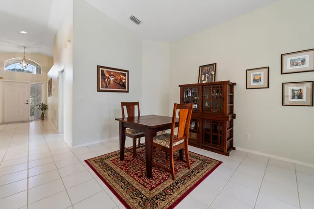 a view of a workspace with furniture