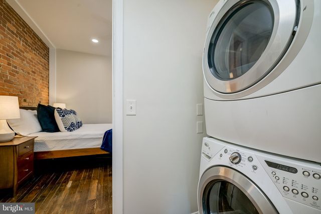 a view of living room washer and dryer