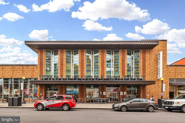 a view of a car park in front of a building