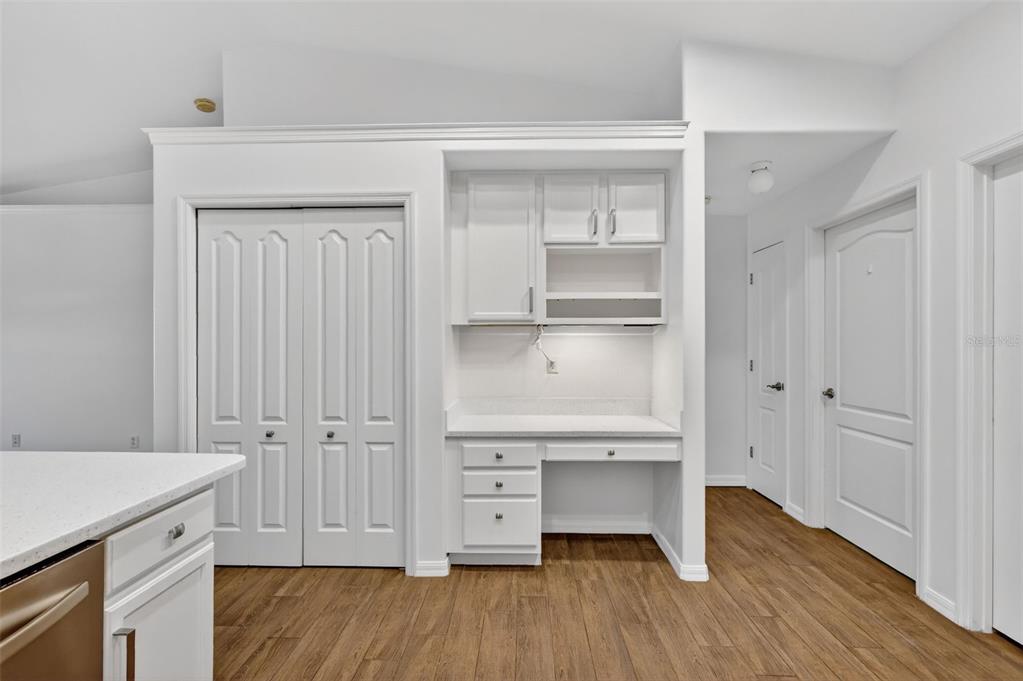 2113 Wolf Ridge Lane Mount Dora, FL 32757 - Photo 24 of 49 a view of an empty room with wooden floor