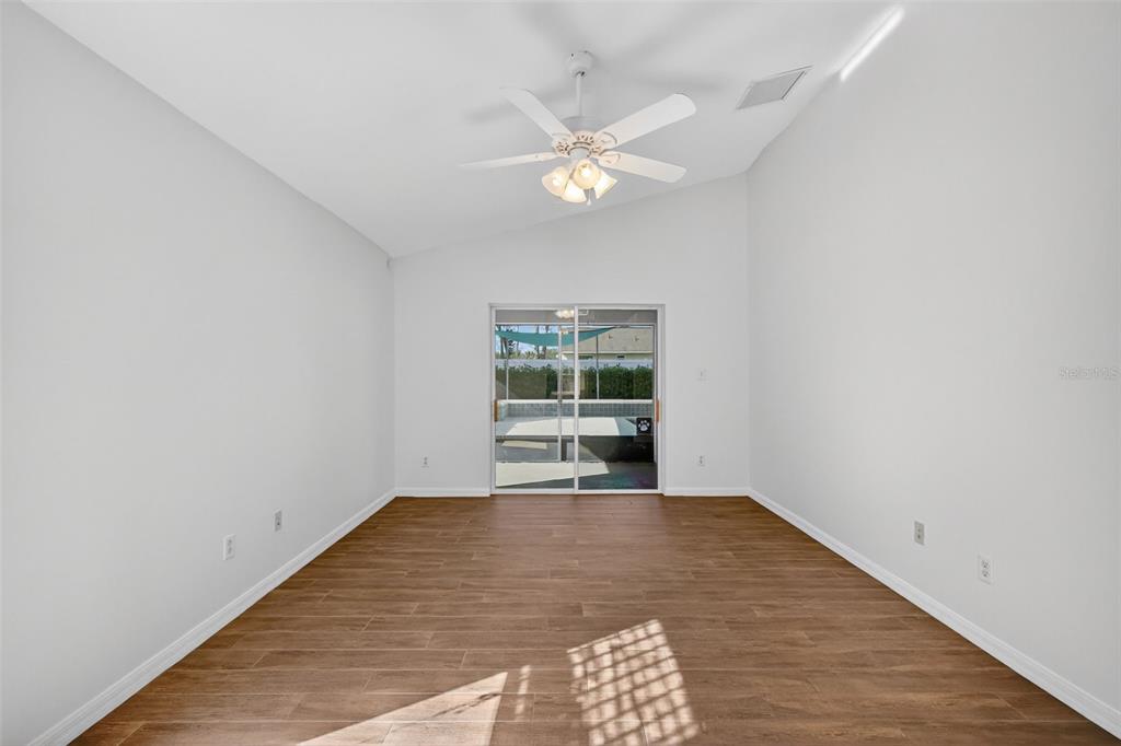 2113 Wolf Ridge Lane Mount Dora, FL 32757 - Photo 26 of 49 a view of an empty room with a window