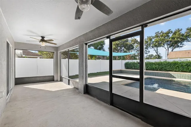a view of an empty room with a balcony