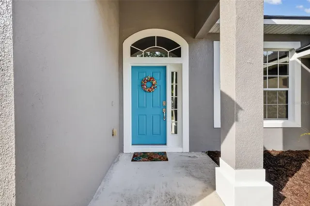 a front view of a house with stairs