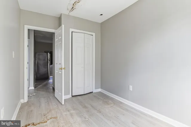 an empty room with closet